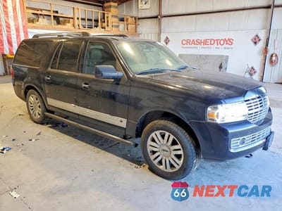 Czwarte zdjęcie samochodu z boku: 2012 LINCOLN NAVIGATOR L VIN:5LMJJ3J54CEL06938 - miniatura