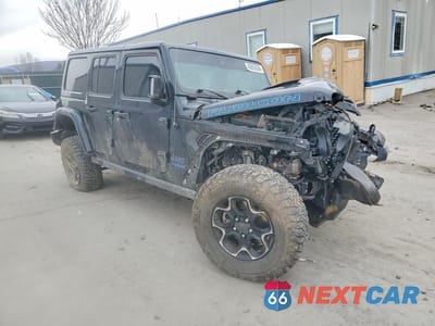 Czwarte zdjęcie samochodu z boku: 2022 JEEP WRANGLER UNLIMITED RUBICON 4XE VIN:1C4JJXR63NW184159 - miniatura
