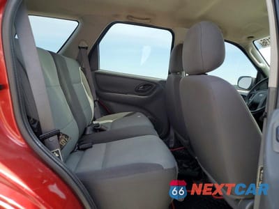 Zdjęcie 11 z 12 samochodu: 2003 FORD ESCAPE XLS VIN:1FMYU021X3KC76963 - miniatura