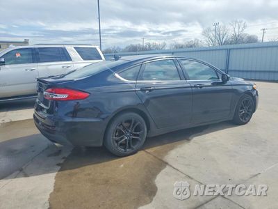 Trzecie zdjęcie samochodu z tyłu: 2019 FORD FUSION SE VIN:3FA6P0HD4KR169752 - miniatura