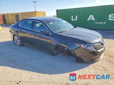 Czwarte zdjęcie samochodu z boku: 2014 LINCOLN MKS VIN:1LNHL9FT2EG610119 - miniatura