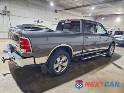 Trzecie zdjęcie samochodu z tyłu: 2014 RAM 1500 SLT VIN:1C6RR7TT7ES370733 - miniatura