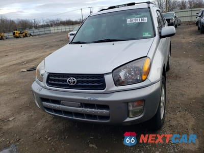 Piąte zdjęcie samochodu w środku: 2001 TOYOTA RAV4 BASE VIN:JTEHH20V716008044 - miniatura
