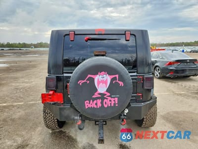 Zdjęcie 6 z 12 samochodu: 2007 JEEP WRANGLER SAHARA VIN:1J4FA54107L228512 - miniatura