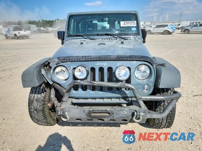 Piąte zdjęcie samochodu w środku: 2015 JEEP WRANGLER SPORT VIN:1C4GJWAG1FL663207 - miniatura