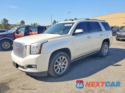 2015 GMC YUKON DENALI 1GKS2CKJ2FR139310 - główne zdjęcie licytacji z USA - miniatura