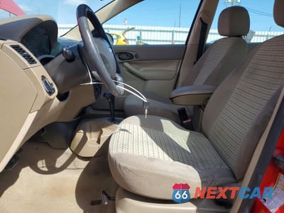 Zdjęcie 7 z 12 samochodu: 2007 FORD FOCUS VIN:1FAHP34N77W217158 - miniatura