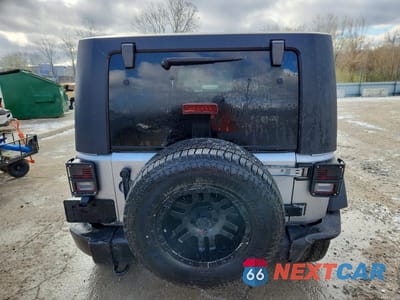 Zdjęcie 6 z 14 samochodu: 2015 JEEP WRANGLER UNLIMITED SPORT VIN:1C4BJWDG0FL742678 - miniatura