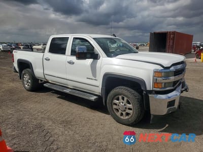 Czwarte zdjęcie samochodu z boku: 2015 CHEVROLET SILVERADO K2500 HEAVY DUTY LTZ VIN:1GC1KWEGXFF612526 - miniatura