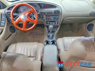 Zdjęcie 8 z 12 samochodu: 2000 PONTIAC GRAND PRIX GTP VIN:1G2WR5211YF150084 - miniatura