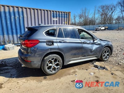 Trzecie zdjęcie samochodu z tyłu: 2019 BMW X1 XDRIVE28I VIN:WBXHT3C56K5L35503 - miniatura