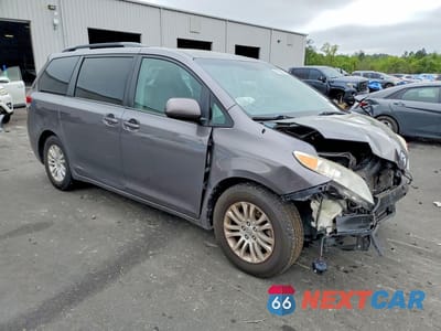 Czwarte zdjęcie samochodu z boku: 2014 TOYOTA SIENNA XLE 8-PASSENGER VIN:5TDYK3DC9ES455288 - miniatura