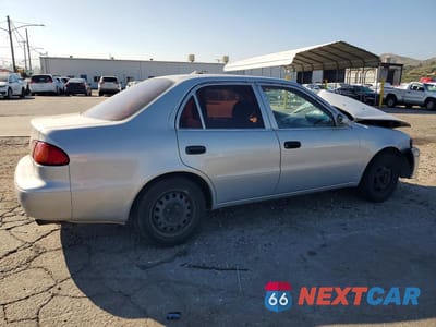 Trzecie zdjęcie samochodu z tyłu: 2001 TOYOTA COROLLA CE VIN:1NXBR12E11Z542629 - miniatura