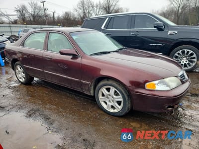 Czwarte zdjęcie samochodu z boku: 2002 MAZDA 626 ES VIN:1YVGF22F725288044 - miniatura