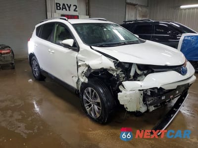 Czwarte zdjęcie samochodu z boku: 2018 TOYOTA RAV4 HYBRID LE VIN:JTMRJREV0JD216146 - miniatura