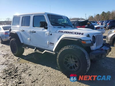 Czwarte zdjęcie samochodu z boku: 2022 JEEP WRANGLER UNLIMITED RUBICON VIN:1C4JJXFG9NW249111 - miniatura