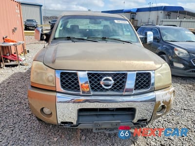 Piąte zdjęcie samochodu w środku: 2004 NISSAN TITAN VIN:1N6AA07B94N523466 - miniatura