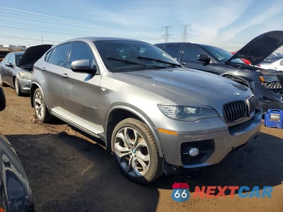 Czwarte zdjęcie samochodu z boku: 2011 BMW X6 XDRIVE50I VIN:5UXFG8C51BLZ96789 - miniatura