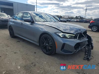 Czwarte zdjęcie samochodu z boku: 2023 BMW 330XI VIN:3MW89FF04P8D72487 - miniatura