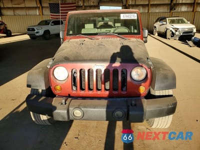 Piąte zdjęcie samochodu w środku: 2007 JEEP WRANGLER SAHARA VIN:1J4GB59197L208334 - miniatura