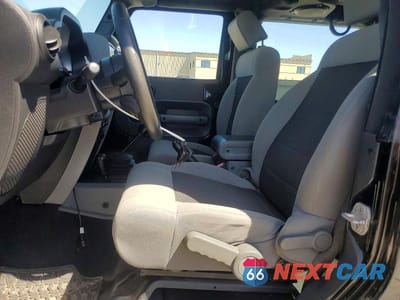 Zdjęcie 7 z 12 samochodu: 2010 JEEP WRANGLER SPORT VIN:1J4AA2D18AL228631 - miniatura