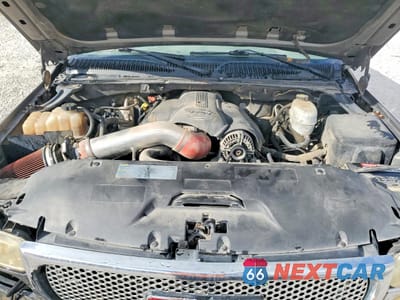 Zdjęcie 12 z 13 samochodu: 2005 GMC YUKON XL DENALI VIN:1GKFK66U45J241602 - miniatura