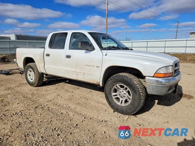 Czwarte zdjęcie samochodu z boku: 2002 DODGE DAKOTA QUAD SLT VIN:1B7HG48N22S616926 - miniatura