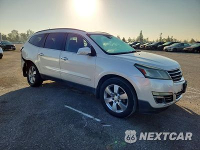 Czwarte zdjęcie samochodu z boku: 2015 CHEVROLET TRAVERSE LTZ VIN:1GNKRJKD1FJ131257 - miniatura