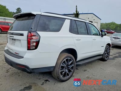 Trzecie zdjęcie samochodu z tyłu: 2023 CHEVROLET TAHOE C1500 RST VIN:1GNSCRKD5PR532250 - miniatura