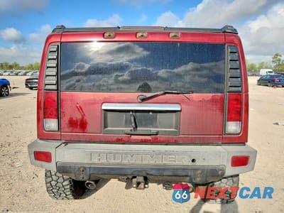 Zdjęcie 6 z 12 samochodu: 2004 HUMMER H2 VIN:5GRGN23U64H104704 - miniatura