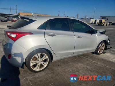 Trzecie zdjęcie samochodu z tyłu: 2014 HYUNDAI ELANTRA GT BASE VIN:KMHD35LH1EU208231 - miniatura
