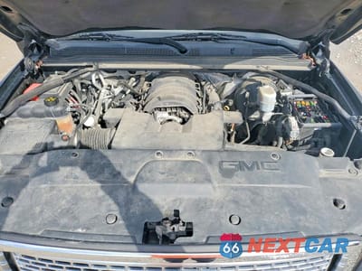 Zdjęcie 12 z 12 samochodu: 2015 GMC YUKON XL DENALI VIN:1GKS2JKJ9FR173734 - miniatura