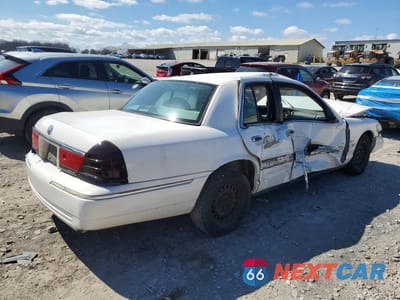 Trzecie zdjęcie samochodu z tyłu: 1999 MERCURY GRAND MARQUIS GS VIN:2MEFM74W3XX700403 - miniatura