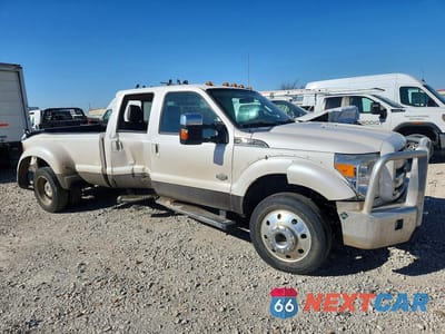 Czwarte zdjęcie samochodu z boku: 2016 FORD F450 SUPER DUTY VIN:1FT8W4DT6GEC52300 - miniatura