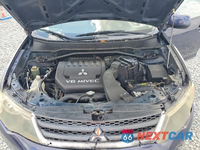 Zdjęcie 12 z 13 samochodu: 2007 MITSUBISHI OUTLANDER ES VIN:JA4MS31X67Z011819 - miniatura