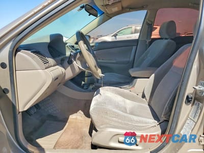 Zdjęcie 7 z 12 samochodu: 2022 TOYOTA CAMRY LE VIN:JTDBE32K920043006 - miniatura