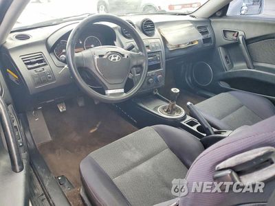 Zdjęcie 8 z 11 samochodu: 2005 HYUNDAI TIBURON GS VIN:KMHHM65DX5U174840 - miniatura