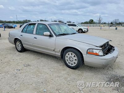 Czwarte zdjęcie samochodu z boku: 2004 MERCURY GRAND MARQUIS GS VIN:2MEFM74W94X665362 - miniatura