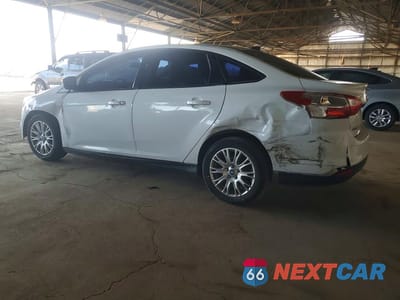 Drugie zdjęcie samochodu z przodu: 2012 FORD FOCUS S VIN:1FAHP3F22CL379360 - miniatura