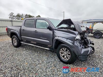 Czwarte zdjęcie samochodu z boku: 2017 TOYOTA TACOMA SR5 V6 VIN:5TFAZ5CN5HX023419 - miniatura