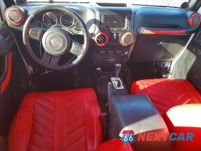 Zdjęcie 8 z 12 samochodu: 2012 JEEP WRANGLER UNLIMITED SAHARA VIN:1C4BJWEG6CL205775 - miniatura