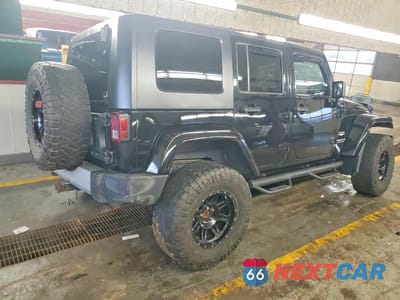 Trzecie zdjęcie samochodu z tyłu: 2010 JEEP WRANGLER UNLIMITED SAHARA VIN:1J4BA5H12AL122496 - miniatura