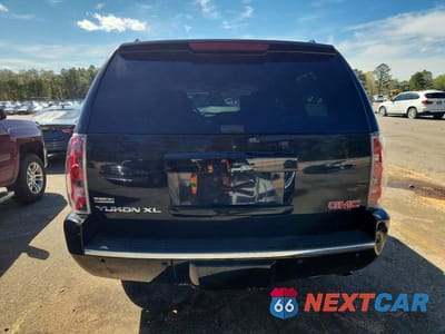 Zdjęcie 6 z 13 samochodu: 2011 GMC YUKON XL DENALI VIN:1GKS2MEF7BR194049 - miniatura