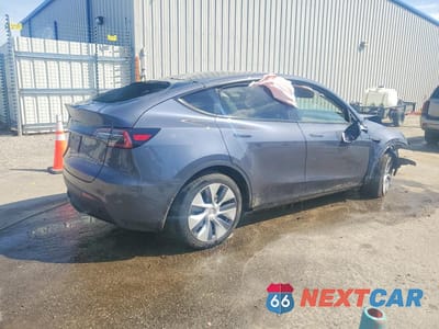 Trzecie zdjęcie samochodu z tyłu: 2023 TESLA MODEL Y VIN:7SAYGDEE7PA196525 - miniatura