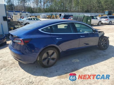 Trzecie zdjęcie samochodu z tyłu: 2018 TESLA MODEL 3 VIN:5YJ3E1EA6JF022951 - miniatura