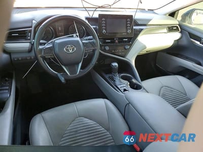 Zdjęcie 8 z 11 samochodu: 2021 TOYOTA CAMRY HYBRID SE VIN:4T1G31AK9MU553008 - miniatura