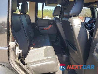 Zdjęcie 10 z 11 samochodu: 2015 JEEP WRANGLER UNLIMITED SAHARA VIN:1C4BJWEG2FL623268 - miniatura