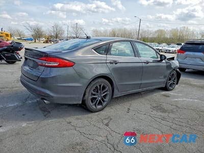 Trzecie zdjęcie samochodu z tyłu: 2018 FORD FUSION SE HYBRID VIN:3FA6P0LU3JR248206 - miniatura