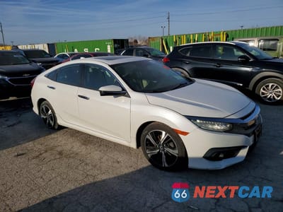 Czwarte zdjęcie samochodu z boku: 2016 HONDA CIVIC TOURING VIN:19XFC1F96GE011566 - miniatura