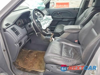 Zdjęcie 7 z 12 samochodu: 2003 HONDA PILOT EXL VIN:2HKYF18583H621405 - miniatura